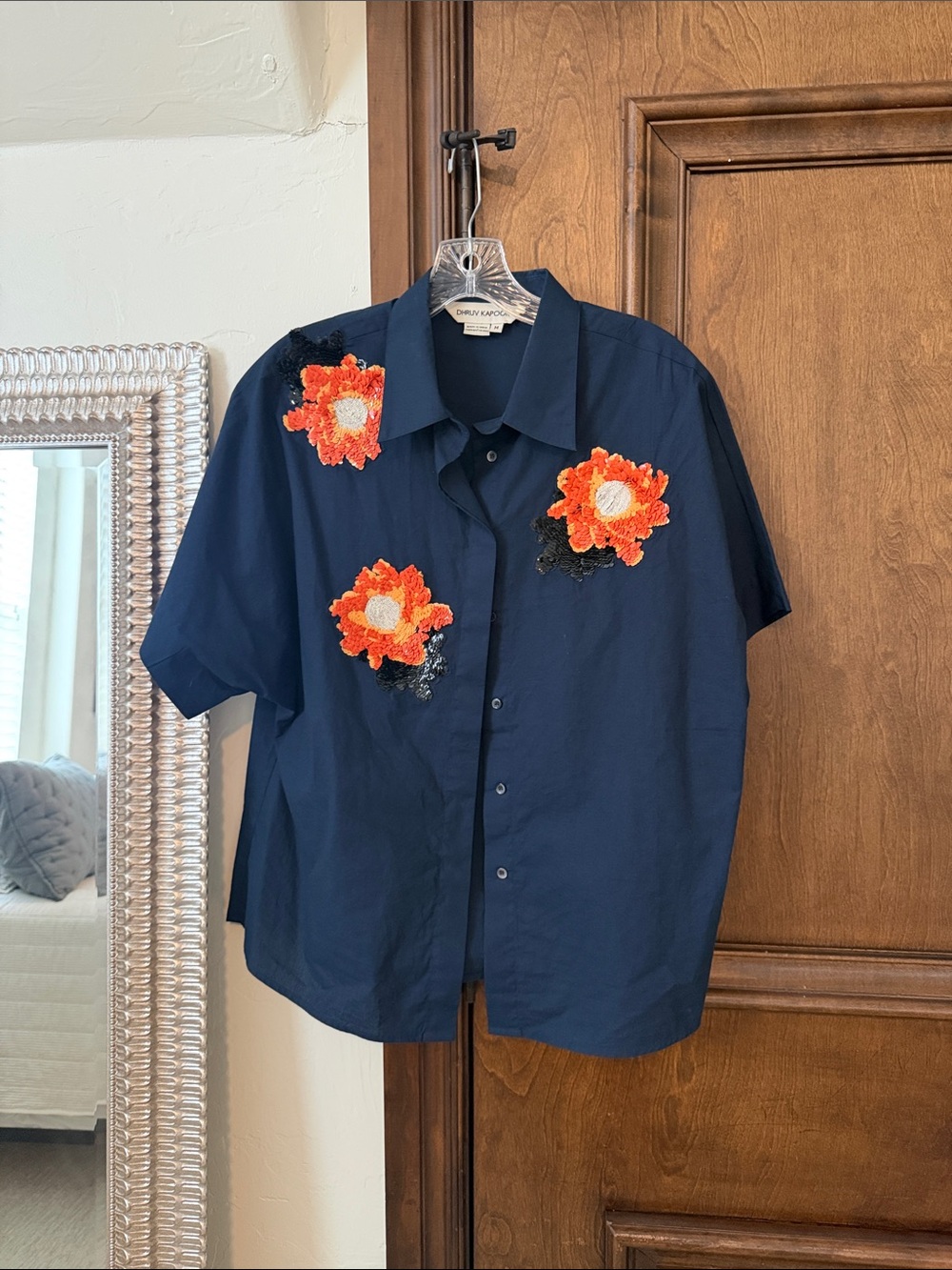 Navy Button-Up Shirt with Orange Floral Appliqués from Anthro